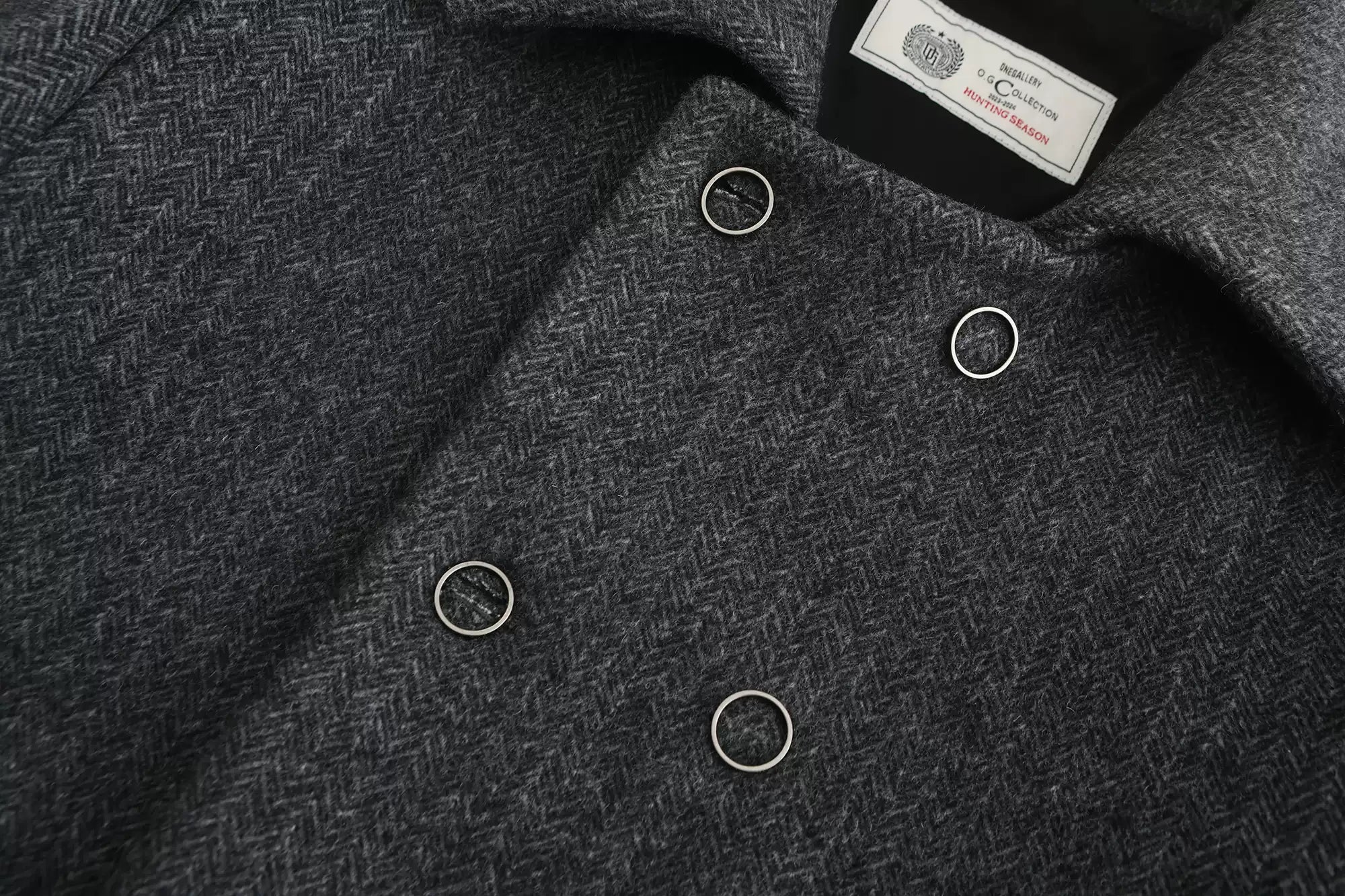 Classic Gray Herringbone Double-Breasted Structured Wool Coat with Unique Lapel